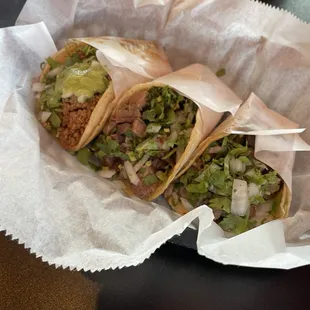 Chorizo left (pork sausage) and lengua (beef tongue)