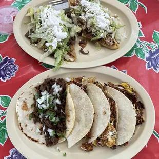 Tlacoyos in the back, plus a plate of tacos