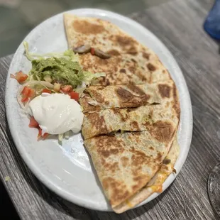 Combination quesadilla my favorite!!  Hot flour tortilla filled with bacon, mushrooms, green Peppers and melted cheese