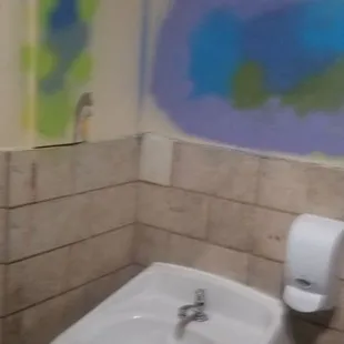 Disgusting outdated restroom that needs remodeling for a so-called nice restaurant in Willow Glen. Piss poor management how sad