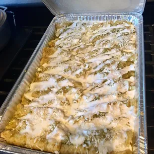 Order of 25 enchiladas verdes de pollo! I got them for a small gathering in the city. Everyone loved them