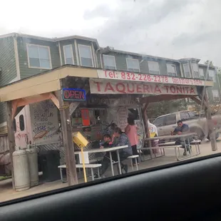 a view of the outside of a restaurant