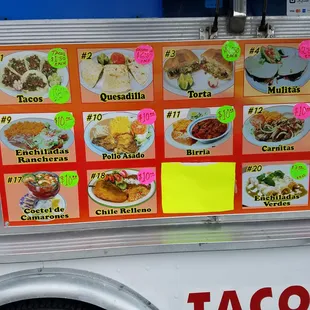 a taco truck with tacos on it