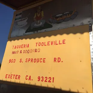 a sign on the side of a building