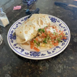 Sausage breakfast burrito with pico