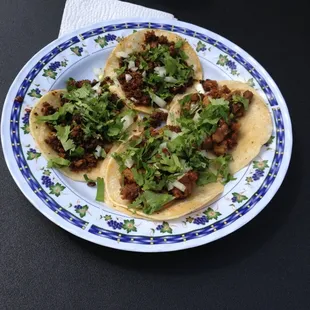 three tacos on a plate