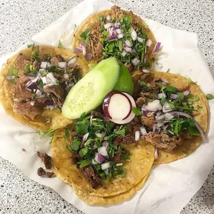 Carne asada and carnitas tacos