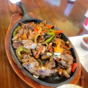 beef and peppers in a skillet
