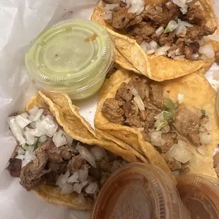 Asada tacos and al pastor tacos