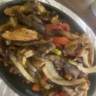 Chicken and beef fajitas.