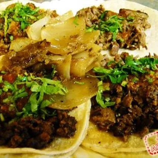 Pollo, Carne, Chorizo and Suadero Tacos