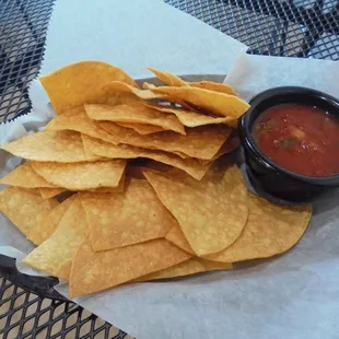 Corn chips with salsa.