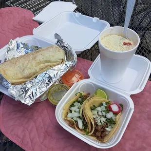 Chicken burrito, street tacos, and elote