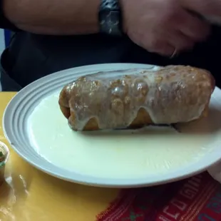 My husband&apos;s chimichanga. It was awesome! He had a hard time finishing it.