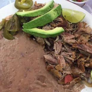 Carnitas with fresh, hot corn tortillas are the best in town!