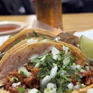 Tacos al pastor and apple soda