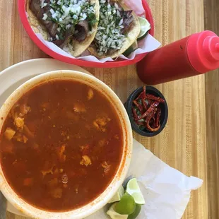 Weekend meal, large menudo and 2 cesina tacos.