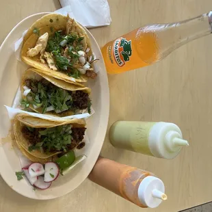 Tacos and green and red sauce