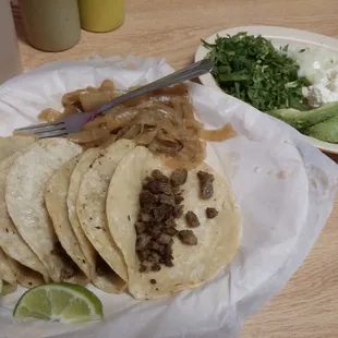 Bistek tacos with the toppings on the side.
