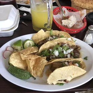 Beef birria taco , buche , and carnitas taco! All really good