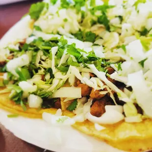 Adobada tacos with all the fixings.