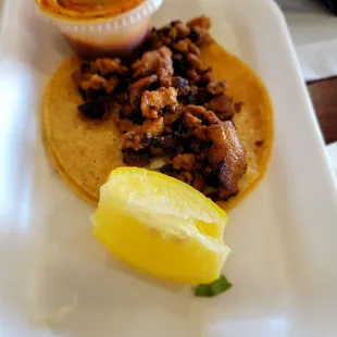 Adobada (grilled, marinated pork) taco w/o vegetables.