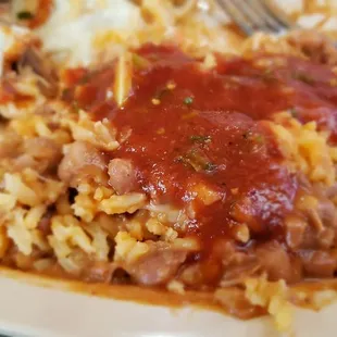 Mix the beans and rice and top with salsa, now it's delicious