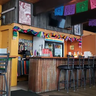 a mexican restaurant with colorful decorations