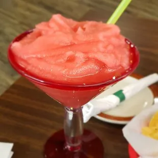 Overflowing strawberry margarita, nice