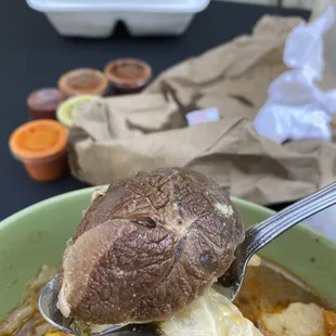 One tablespoon of meat for a $8 caldo de res.