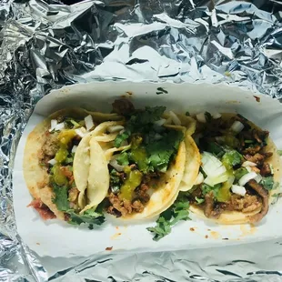 Chicharron y pastor tacos with verde salsa