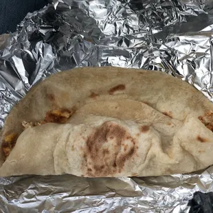 a tortilla wrapped in foil