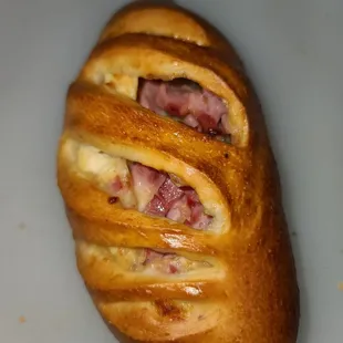 Cream cheese jalapeño and ham bolillo.