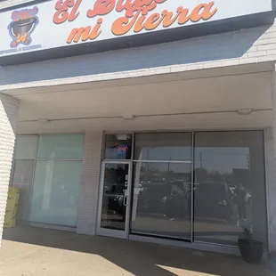 Outside.  New sign 2025.