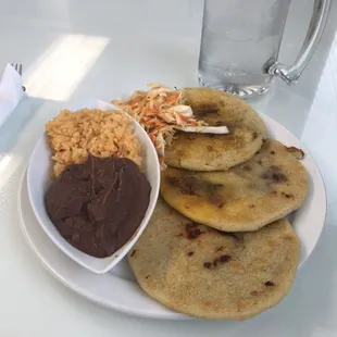 The pupusa combo plate.
