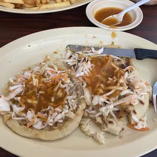 2 pupusas revueltas, w/ encurtido and salsa