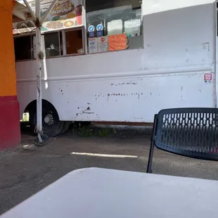 a taqueria truck parked in a parking lot
