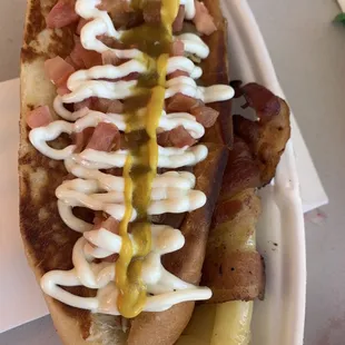 Chipilon. It has the melted cheese inside and a grilled bun.