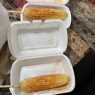 The border of delicious corn on the cobs