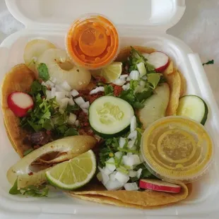 Tacos with cooked onions.