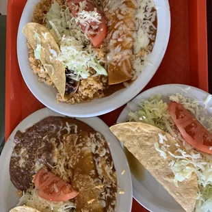 three plates of mexican food