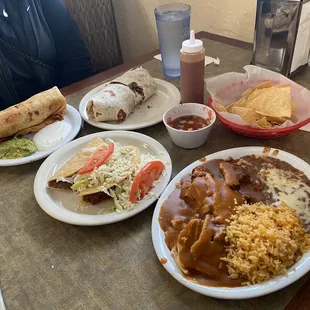 Lunch at Taqueria Yvette-chimichanga, burrito, tamale meal and some tacos.
