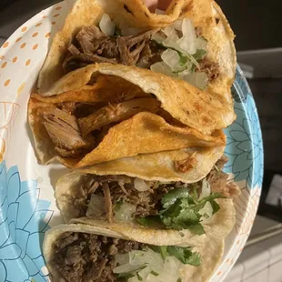 Left to right is birria , Al pastor , carnitas and asada