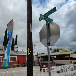 a stop sign and street signs