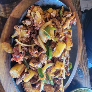 Special Pork Fajitas with bacon, pineapple, tomatoes, and jalapenos