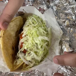 Carne asada Taco with lettuce and tomato