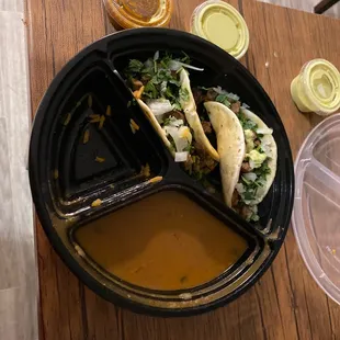 Bisteak tacos, rice (I ate) and charro beans.