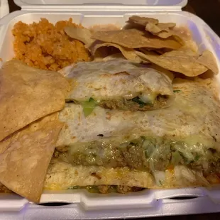 Carne Asada quesadilla with rice, beans, and chips.