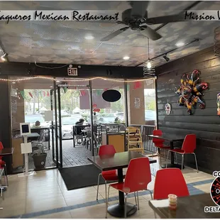 Inside dining area; lots of space between tables. (Thumbs up)