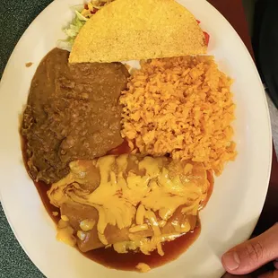 Enchilada and crispy taco combo.